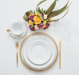 Entertaining and elegant dining is made easy with this complete dining set. This dinnerware set from Porcelana Schmidt is made of fine and durable porcelain, complete with serving pieces. Elegant and attractive dinnerware set, perfect for everyday use or a holiday gathering. This set features a brilliant gold rim border to create a truly rich looking design.